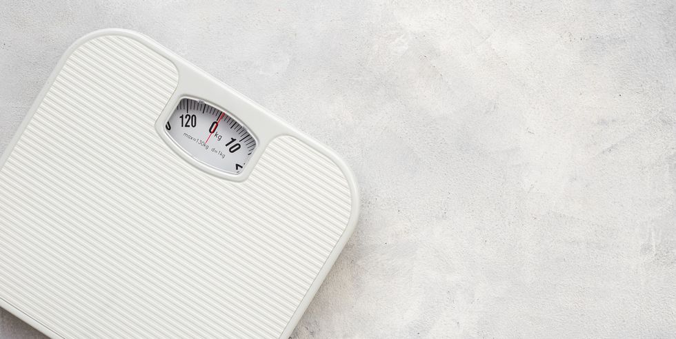 check your body shape with white weight scales, top view