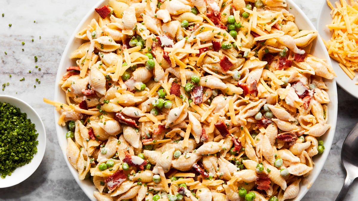 Video player poster image preview for This Cheddar, Bacon & Pea Pasta Salad Wouldn't Be Complete Without Its Simple Creamy Dressing