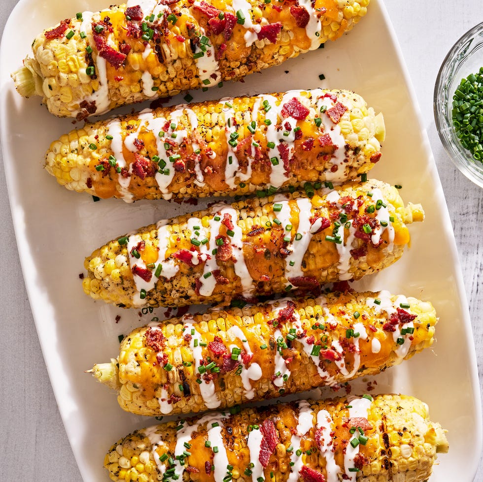 grilled corn with melted cheddar, bacon, and a drizzle of ranch