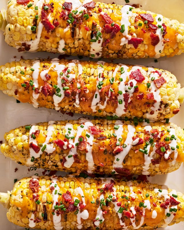 grilled corn with melted cheddar, bacon, and a drizzle of ranch