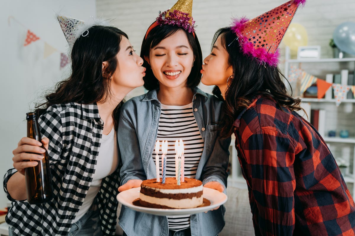 birthday wishes for cousins, cheerful women kissed by girl best friends