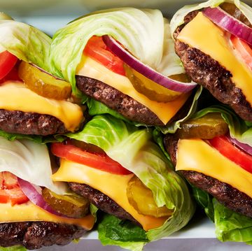 cheesburger with tomato wrapped inside cabbage