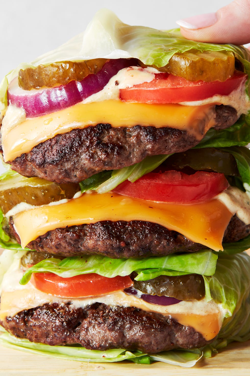 Cheeseburger Cabbage Wraps cheesburger with tomato wrapped inside cabbage