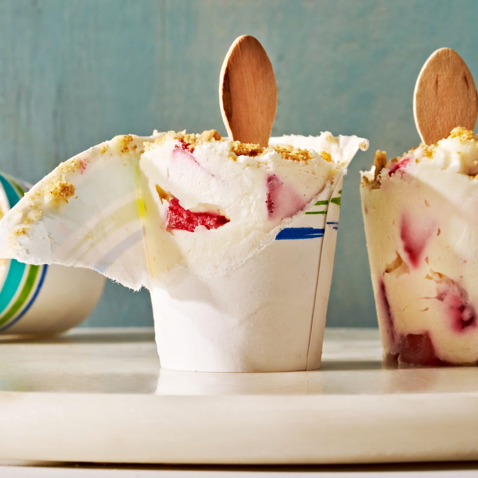 cheesecake pops with a strawberry swirl and crumble topping