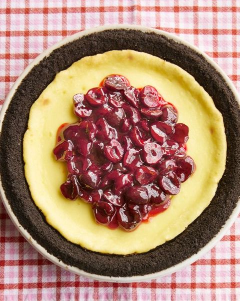 cherry topped cheesecake in pie pan