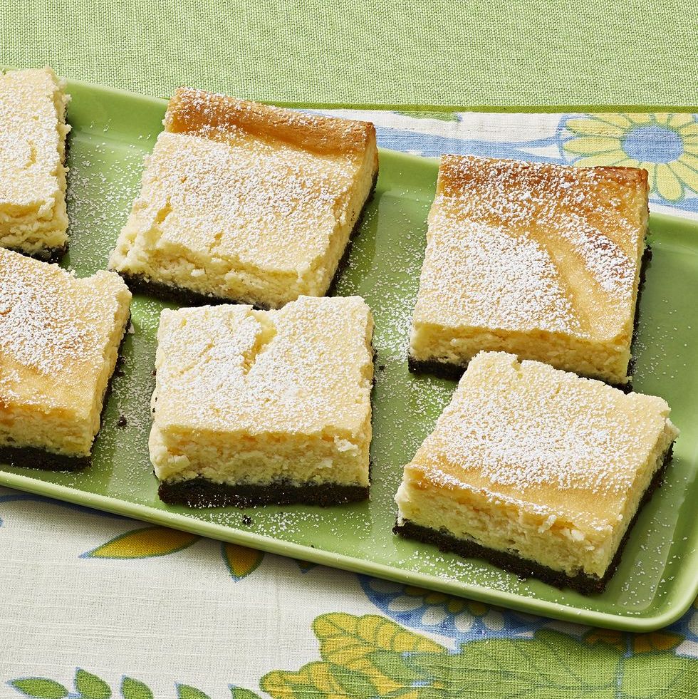 key lime pie cheesecake bars on green plate