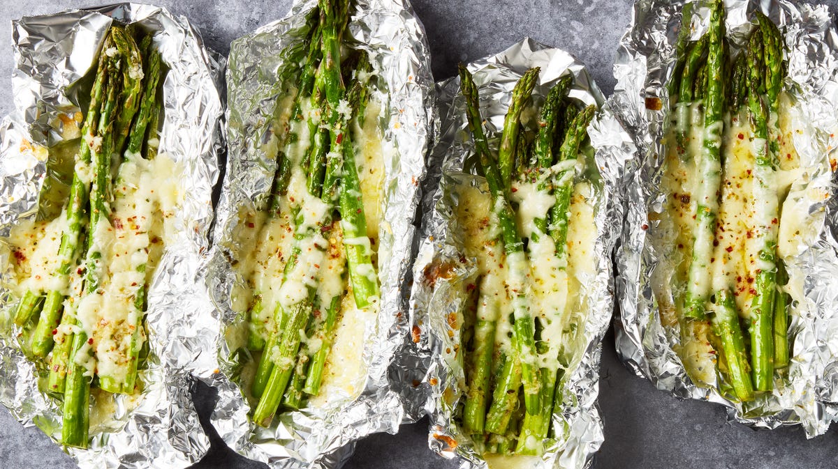 Video player poster image preview for Cheesy Asparagus Foil Packs Will Be Your New Favorite Side