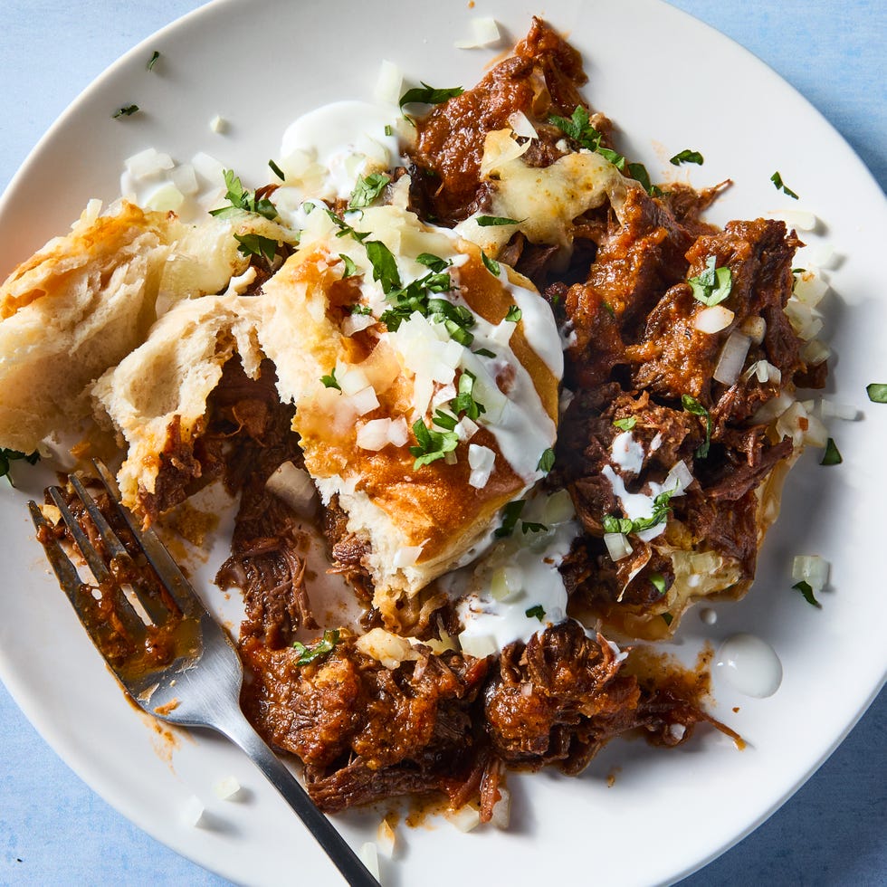 casserole filled with barbacoa topped with biscuits