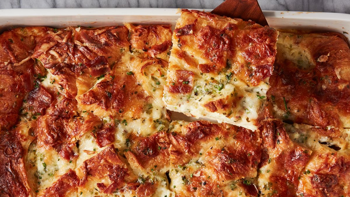 preview for This Cheesy Croissant Casserole Slays All Other Breakfast Bakes