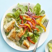 cheesy tex mex stuffed chicken and a green side salad with bell peppers