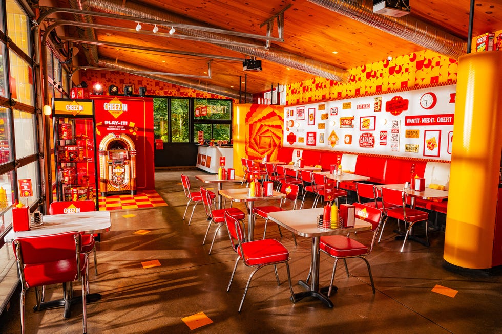 a restaurant with tables and chairs
