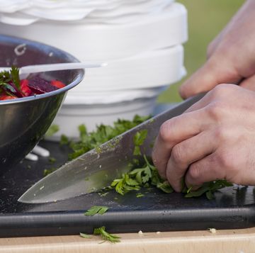chef chopping parsley