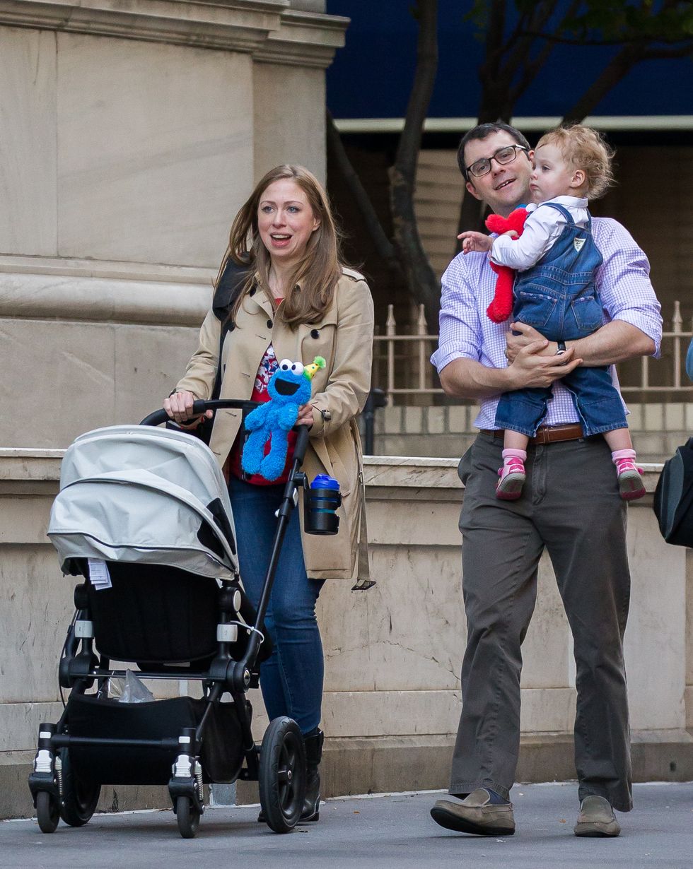 Chelsea Clinton, Marc Mezvinsky, and their daughter Charlotte