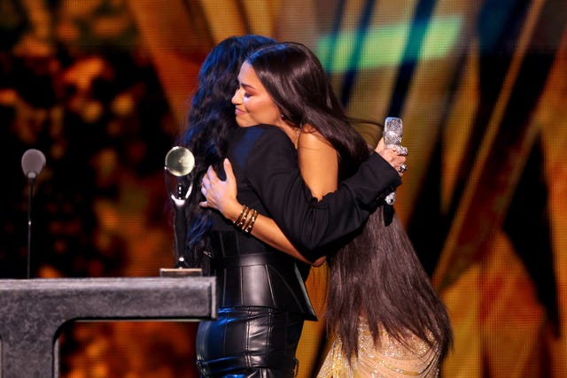 Zendaya pays tribute to Cher in a vintage gold naked dress