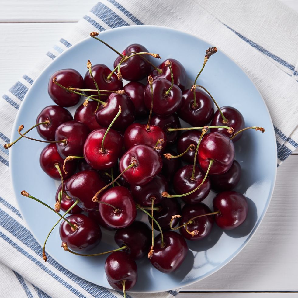 red ripe sweet cherry on a plate