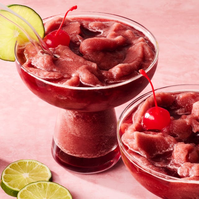 Cherry Coke Margarita Slushies frozen cherry coke margaritas with a lime wheel and popsicles