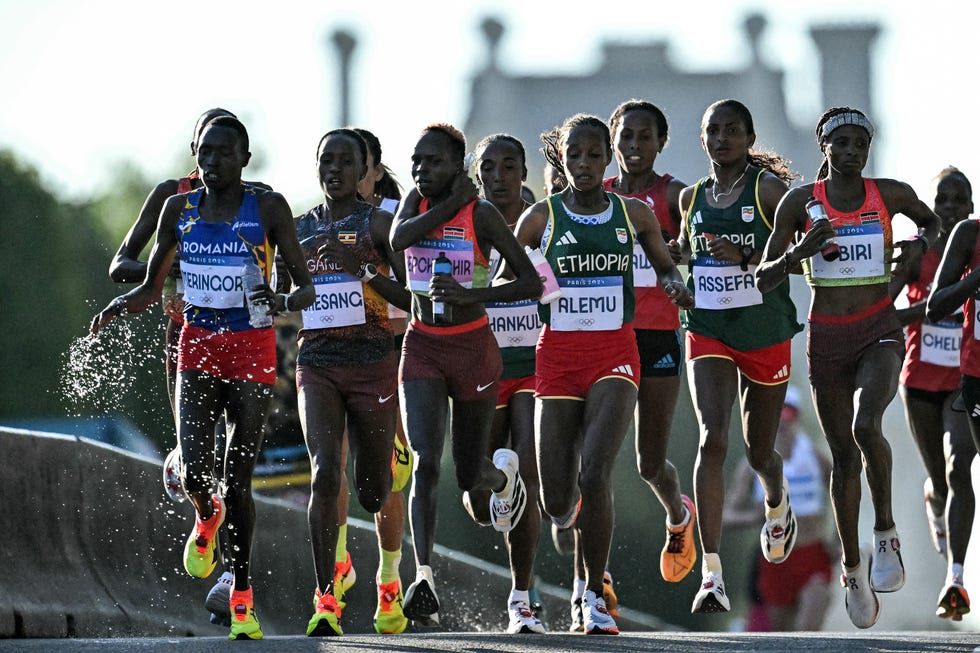 From left: Delvine Relin Meringor of Romania, Stella Chesang of Uganda, Peres Jepchirchir of Kenya, Alemu of Ethiopia, Tigst Assefa of Ethiopia and Hellen Obiri of Kenya compete in the women's athletics marathon at the 2024 Olympic Games in Paris on August 11, 2024. Photo by Kirill Kudryavtsev AFP Photo by Kirill Kudryavtsevafp via Getty Images