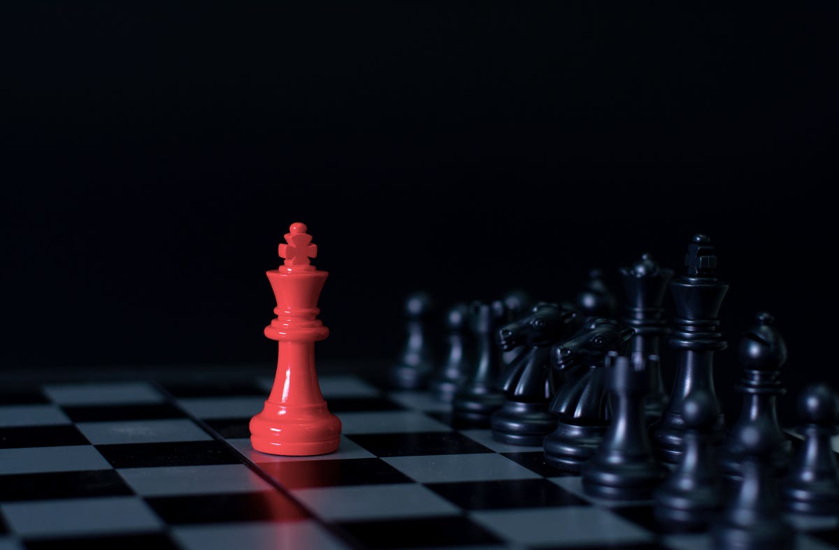 Red Queen Chess Standing Against Black Background Stock Photo