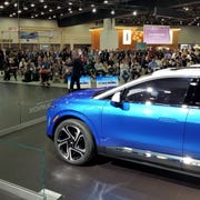 Steve Majoros, VP of Chevy Marketing, talks up Equinox EV at 2022 Detroit auto show. steve majoros, vp of chevy marketing, talks up equinox ev at 2022 detroit auto show