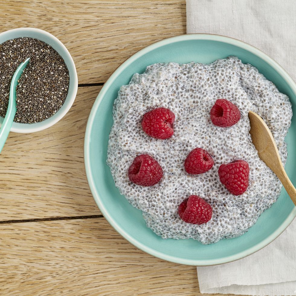 chia pudding made of chia seeds with almond milk and raspberries