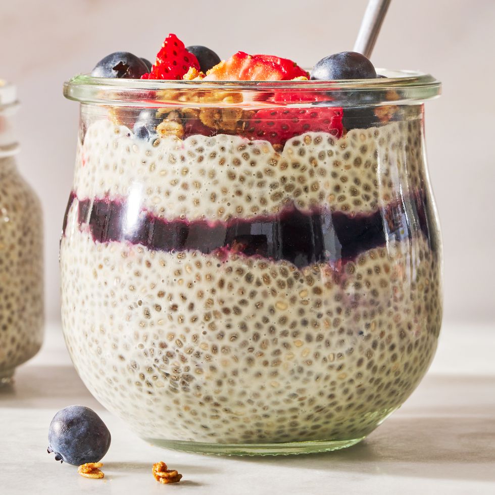 chia pudding with berries, granola, and jam