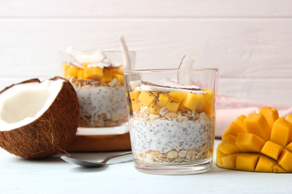 chia pudding with mango, granola and honey healthy dessert, proper nutrition
