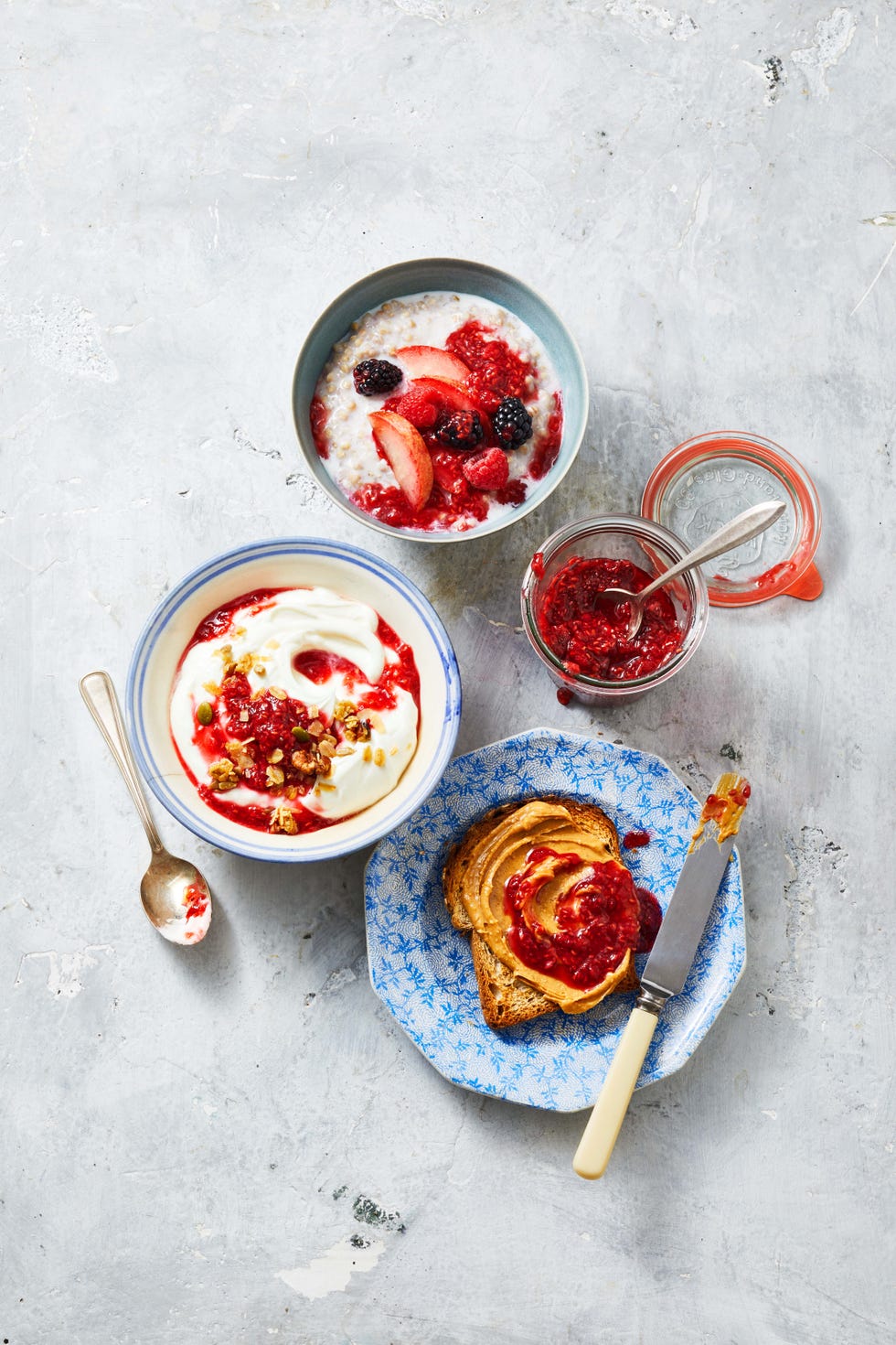 raspberry chia pudding on oatmeal, toast, and yogurt