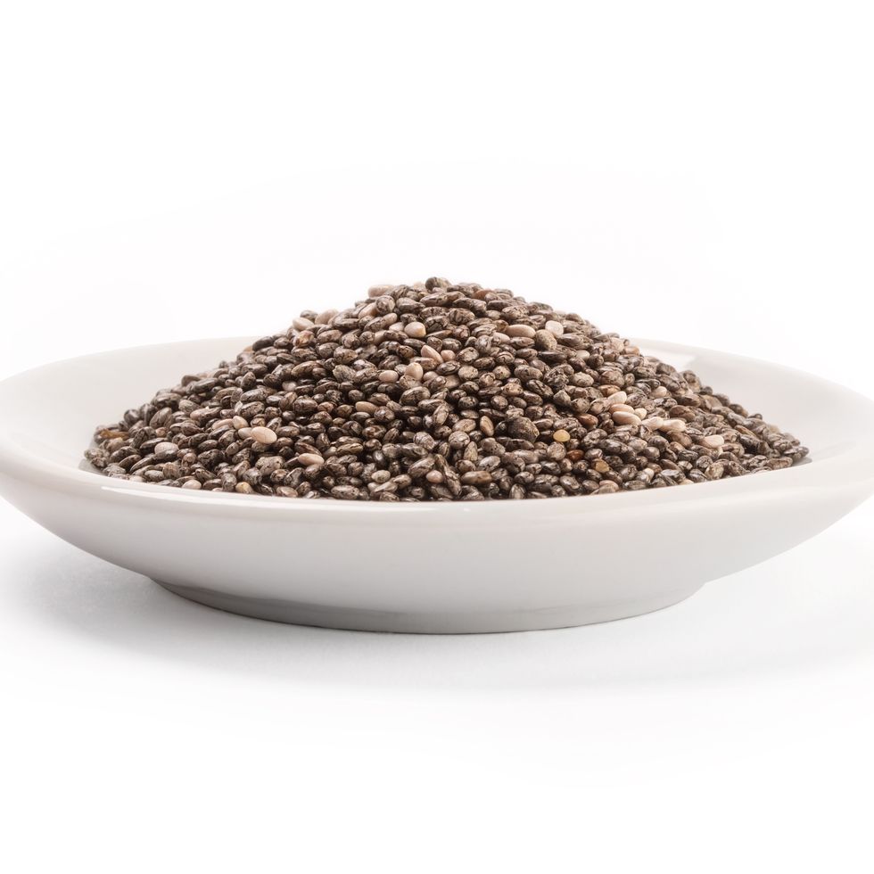 chia seeds over white background