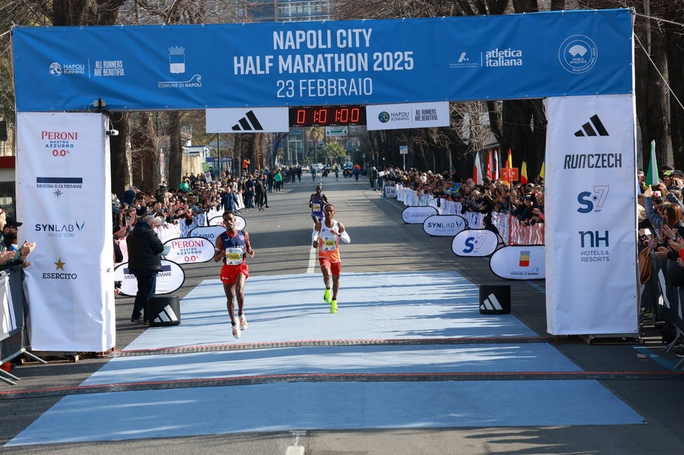 runners competing in the napoli city half marathon 2025