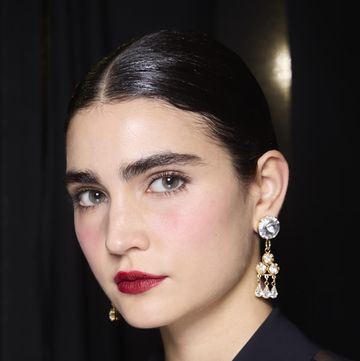 a woman with earrings