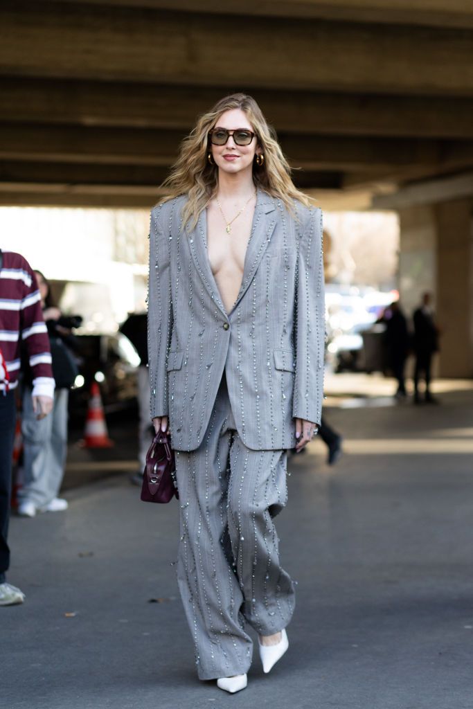 Streetstyle photo of Chiara Ferragni in a gray suit in Paris