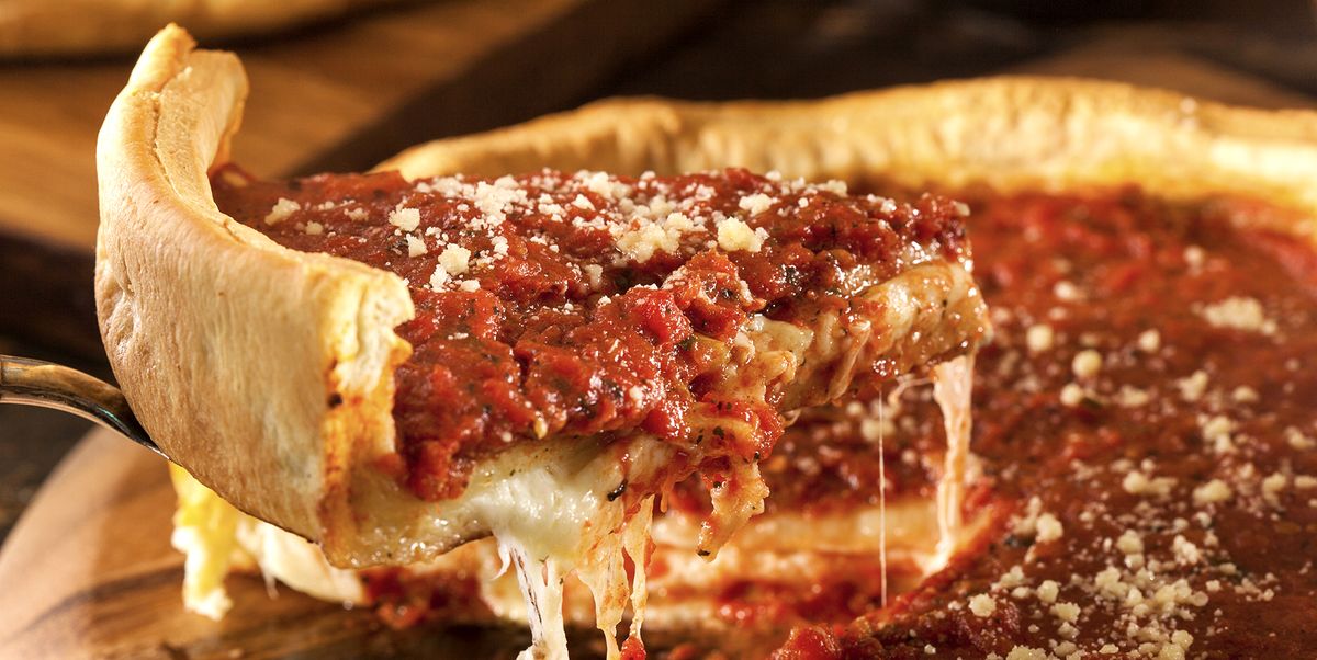A slice of the chicago style deep dish cheese pizza