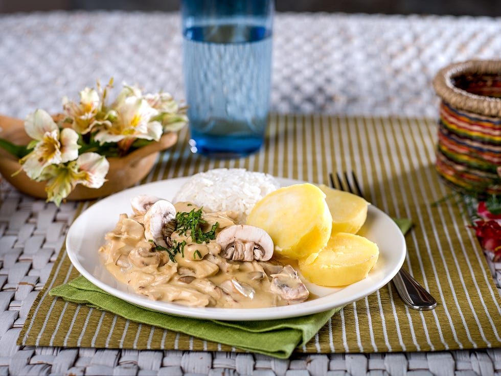 Chicken a La King with rice and potatoes