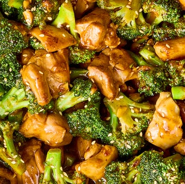 stir fried pieces of chicken and broccoli