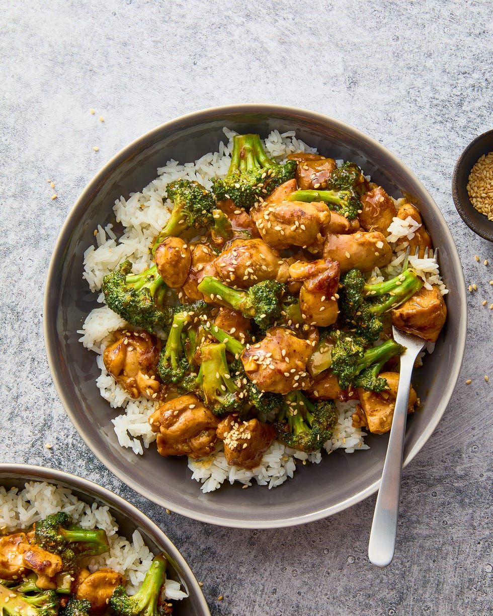 stir fried pieces of chicken and broccoli