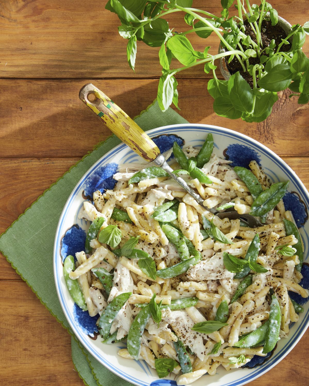 chicken and snap pea pasta with creamy garlicbasil sauce