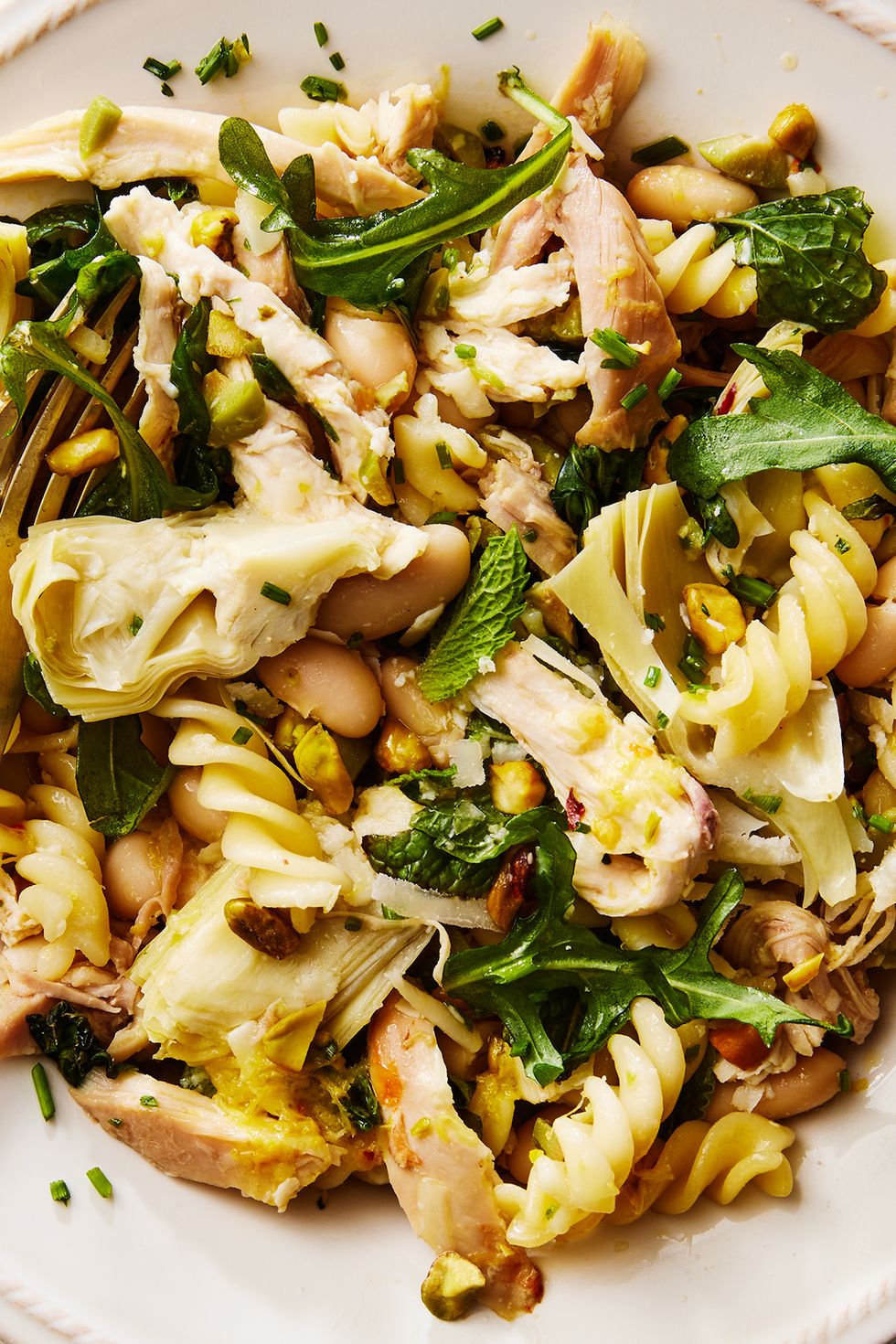 chicken, artichokes, spinach, and noodles tossed with pasta