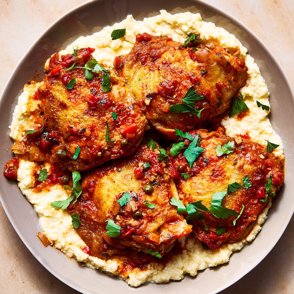 chicken in a tomato sauce over polenta