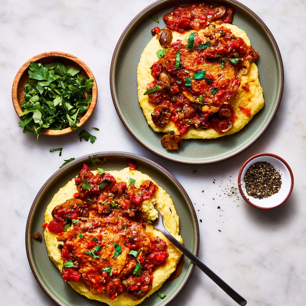 chicken in a tomato sauce over polenta
