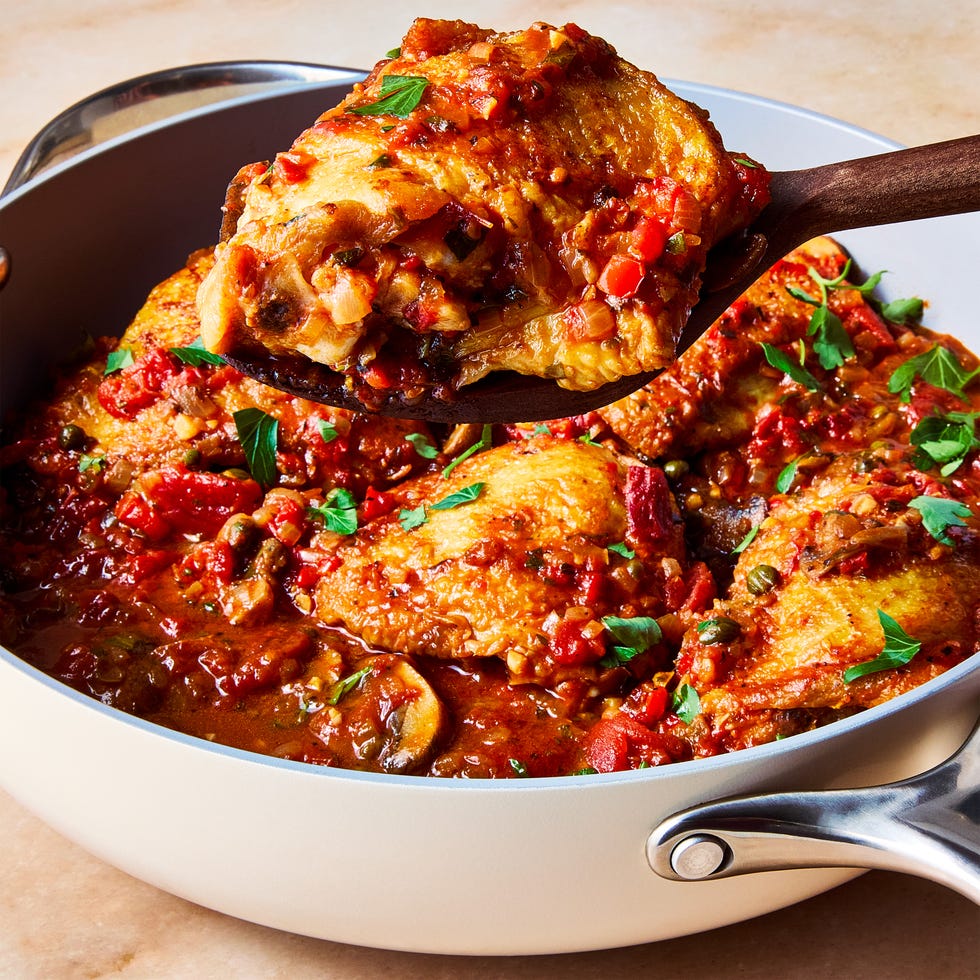 chicken in a tomato sauce over polenta