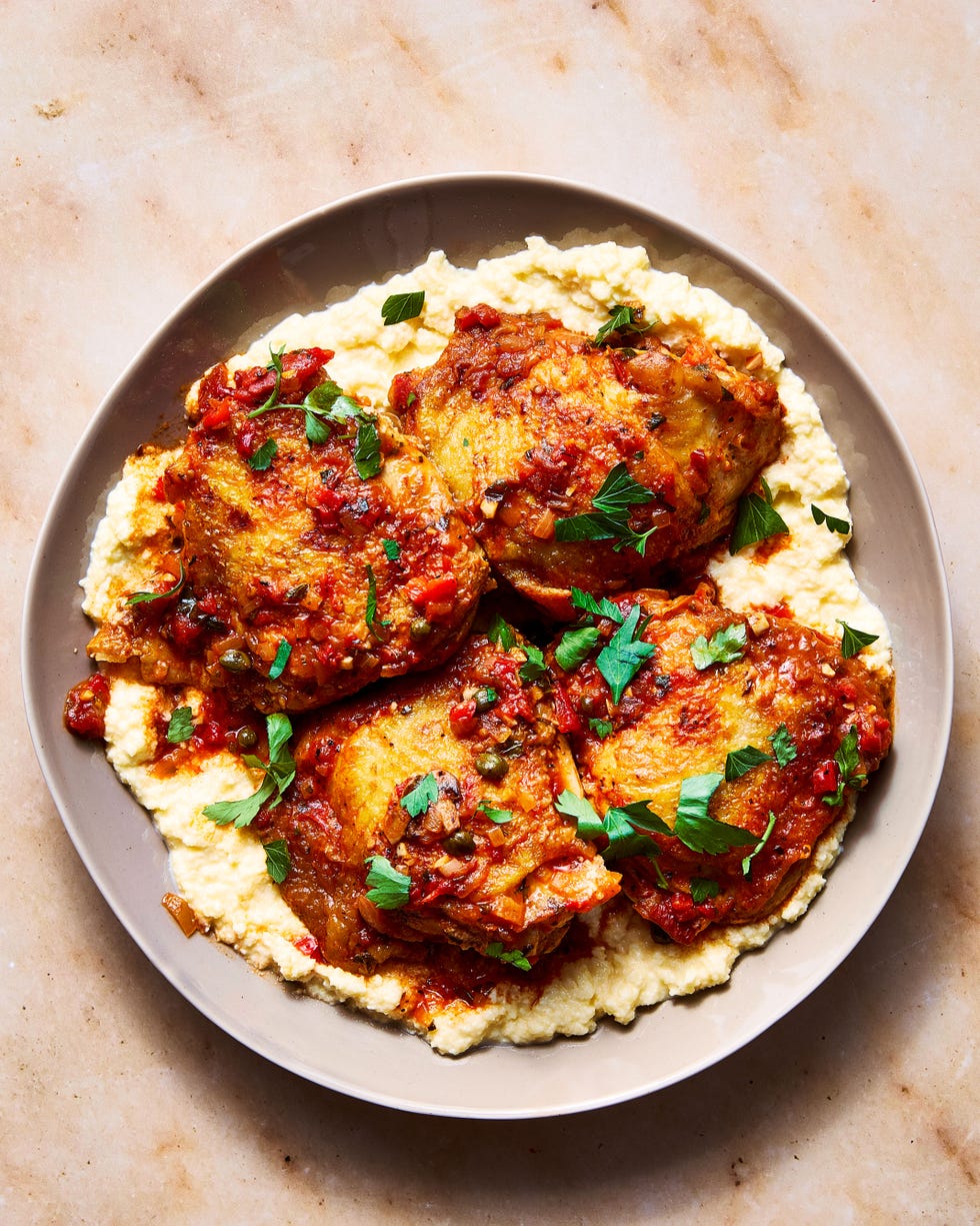 chicken in a tomato sauce over polenta