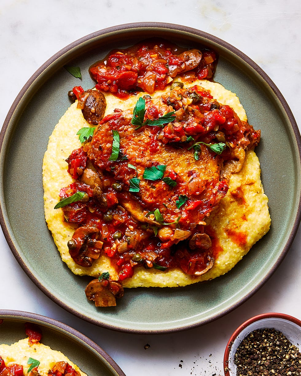 chicken in a tomato sauce over polenta