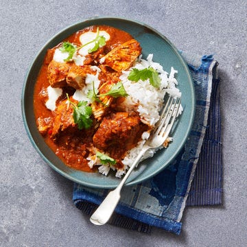 chicken curry with white rice on a plate