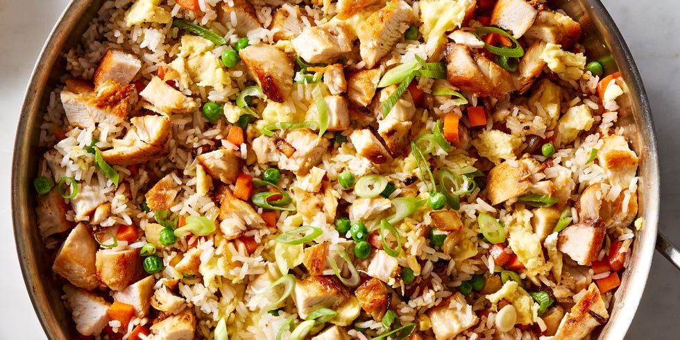 fried rice with chicken, egg, peas, carrots, and green onion