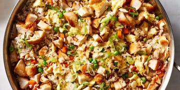 fried rice with chicken, egg, peas, carrots, and green onion