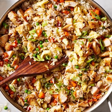 fried rice with chicken, egg, peas, carrots, and green onion