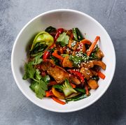 Chicken meat with vegetable in bowl stir fry on wok