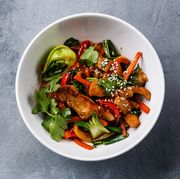 Chicken meat with vegetable in bowl stir fry on wok