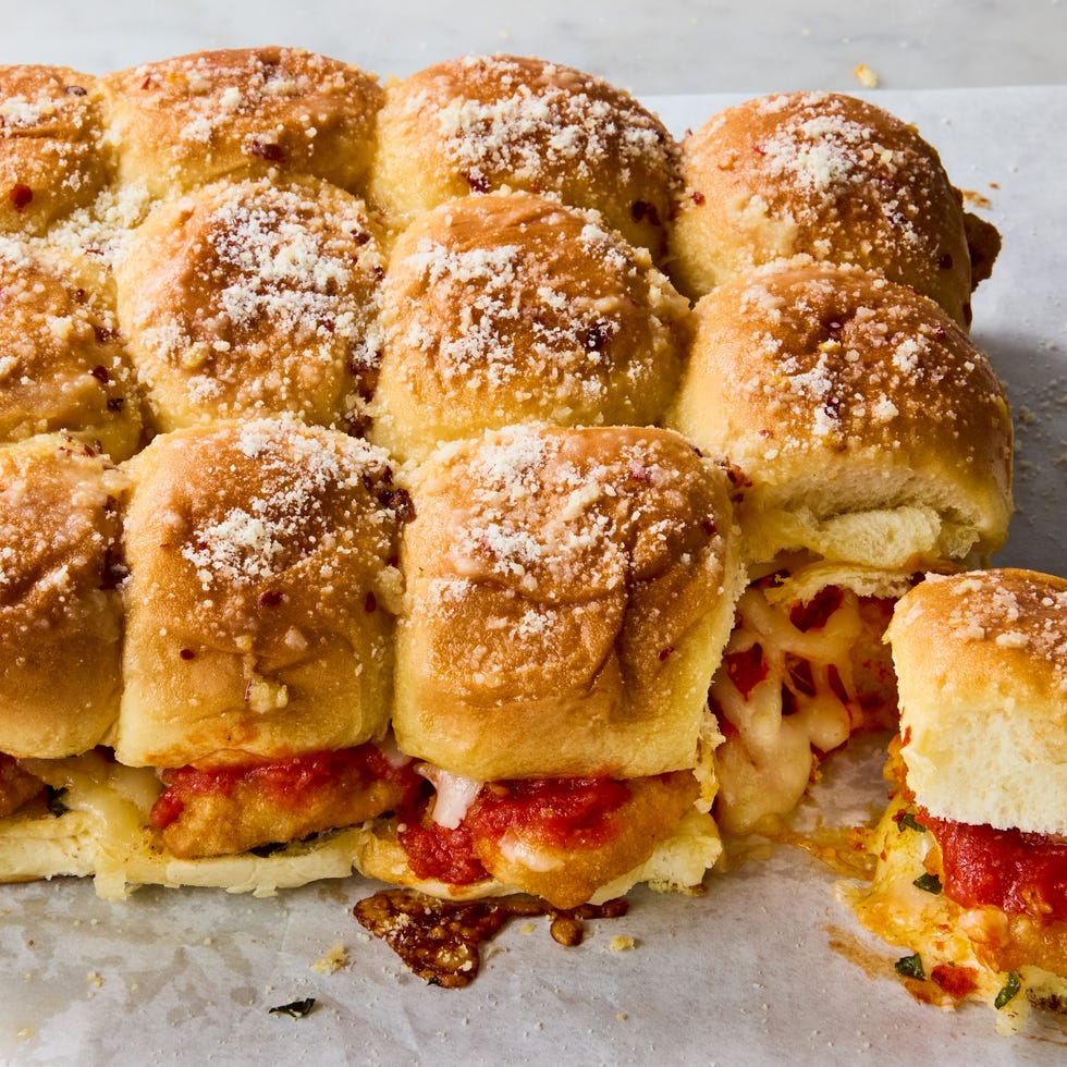 breaded chicken topped with cheese and marinara in slider buns