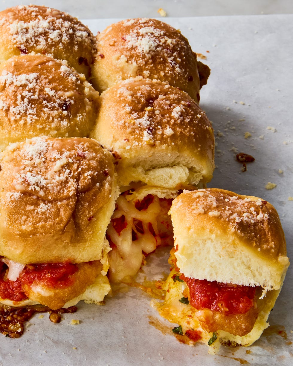breaded chicken topped with cheese and marinara in slider buns